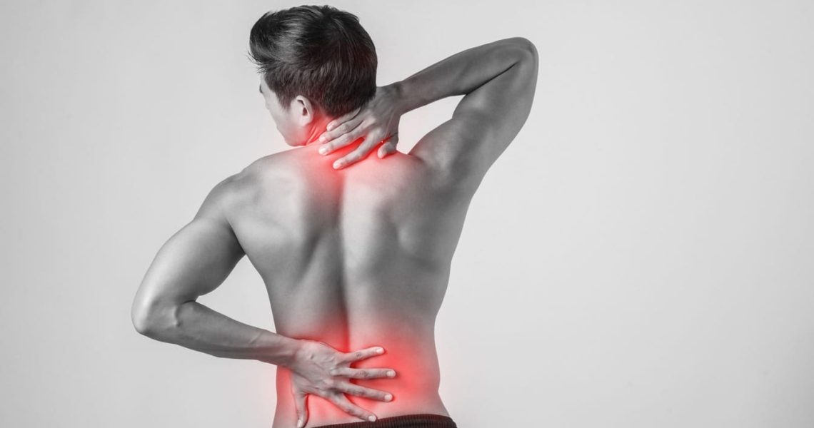 close-up-man-rubbing-his-painful-back-isolated-white-background